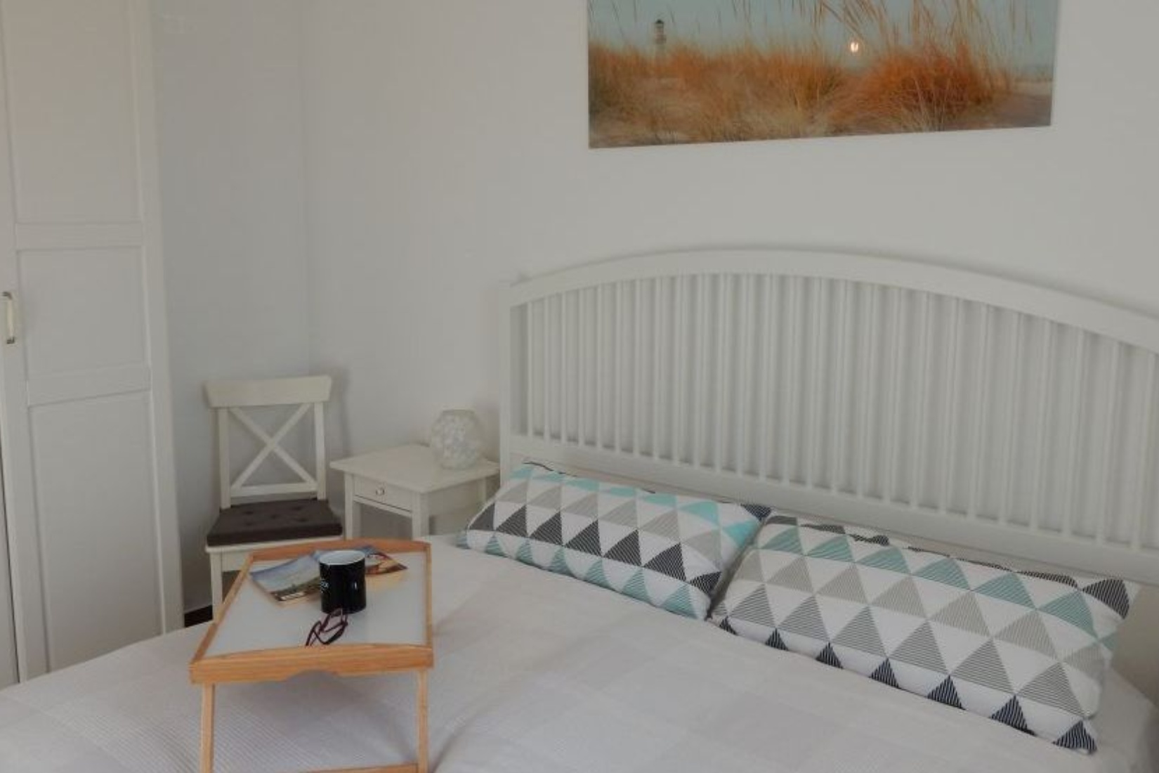 Gemütliches Schlafzimmer im Ferienhaus Familienzeit &copy; @cramer